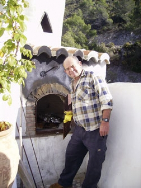 Antonio el Zumbo tilbereder lam i en udend�rs ovn.