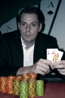 Jim Schultz med de kort der sikrede ham sejren i International Poker Open.